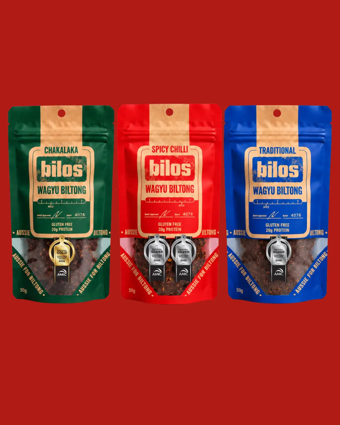 Bilos wagyu biltong trio, three bags on a red background